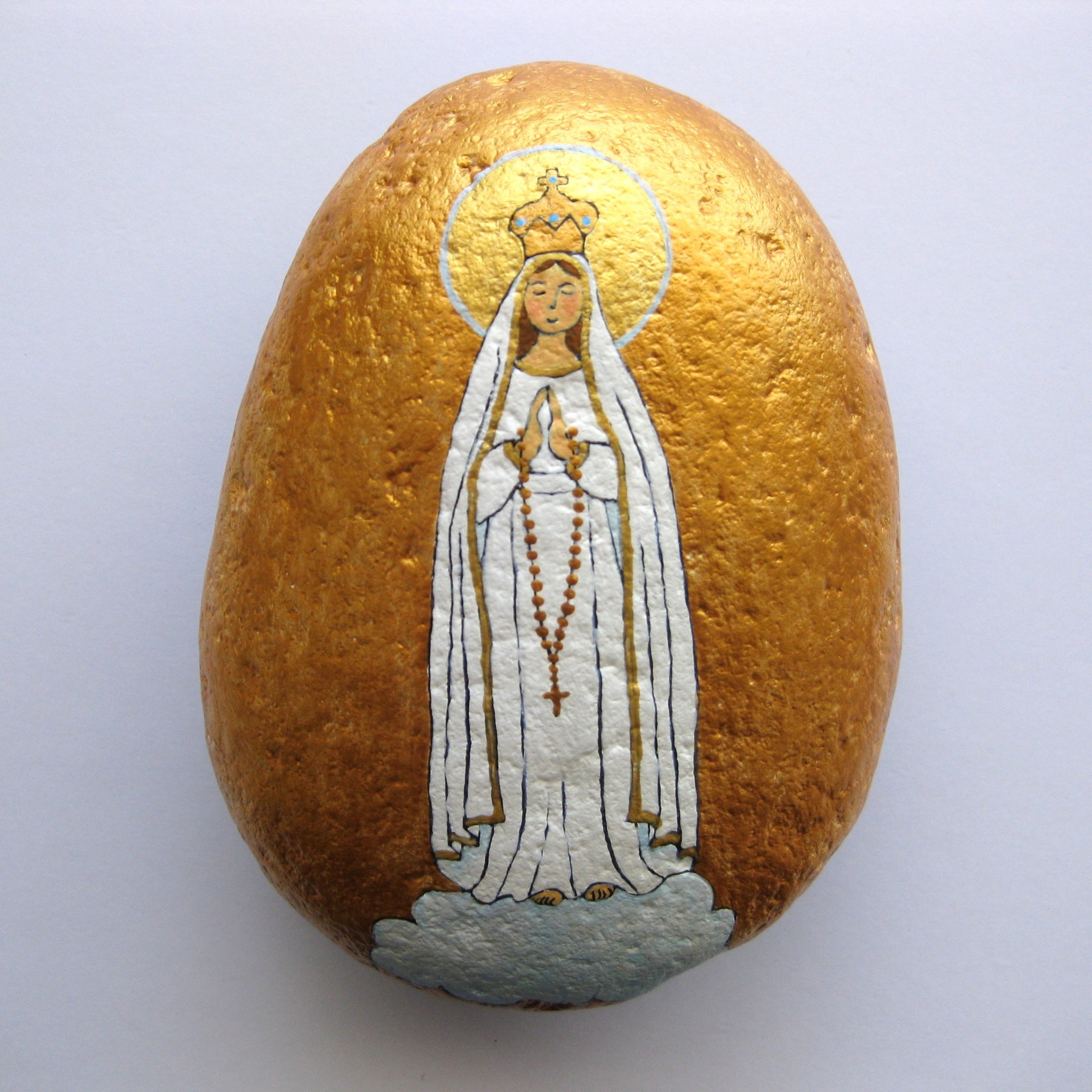 Virgen de Fatima sobre piedra